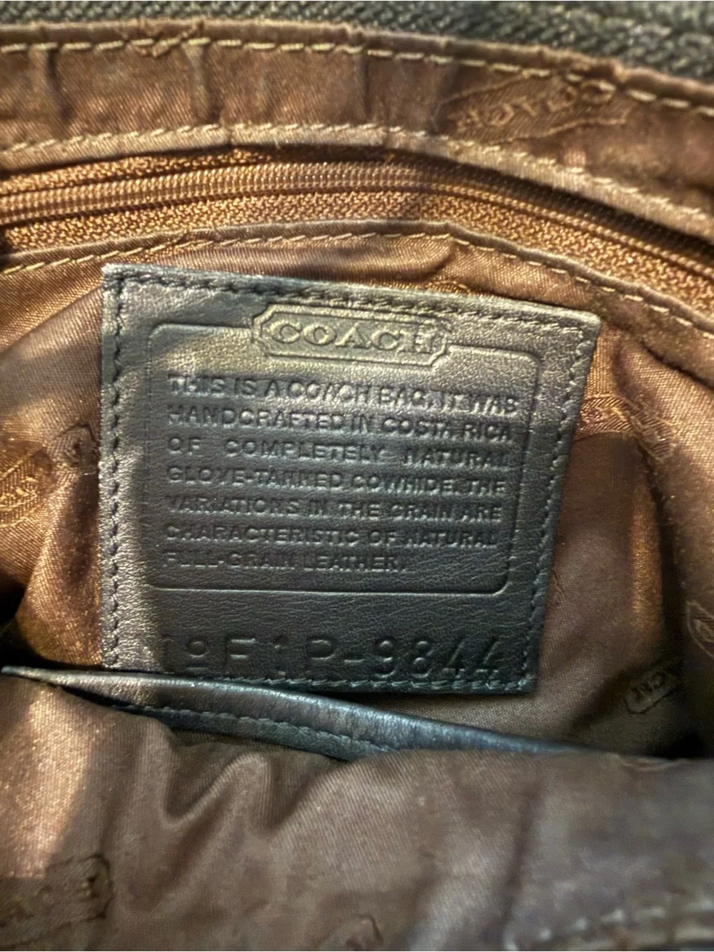Coach sleek black